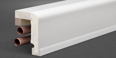 Die Heizungsrohrverkleidung weiß lackiert 85 × 65 mm, Massivholz, Oberkante abgerundet von Leisten Wagner Nahaufnahme.